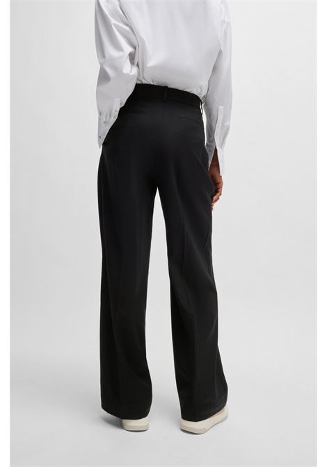 NAOMI x BOSS Pantaloni regular fit in lana elasticizzata naturale BOSS | Pantaloni | 50525955001