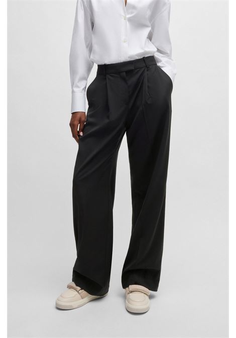 NAOMI x BOSS Pantaloni regular fit in lana elasticizzata naturale BOSS | Pantaloni | 50525955001