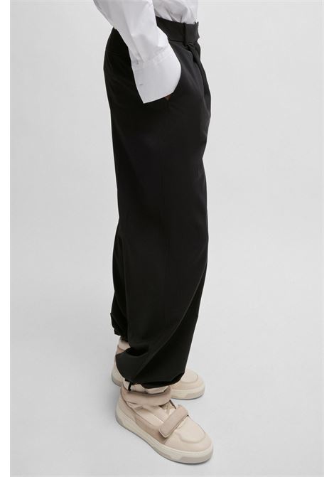 NAOMI x BOSS Regular fit pants in natural stretch wool. BOSS |  | 50525955001