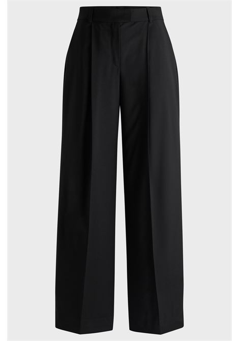 NAOMI x BOSS Pantaloni regular fit in lana elasticizzata naturale BOSS | Pantaloni | 50525955001